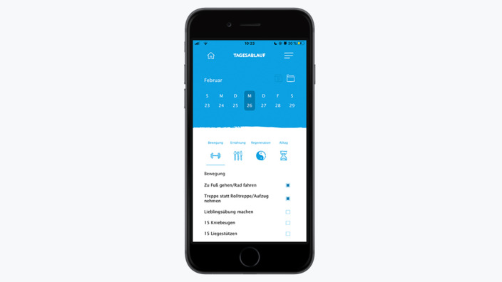 Smartphone mit Bildausschnitt missionmacher-App zum Tagesablauf